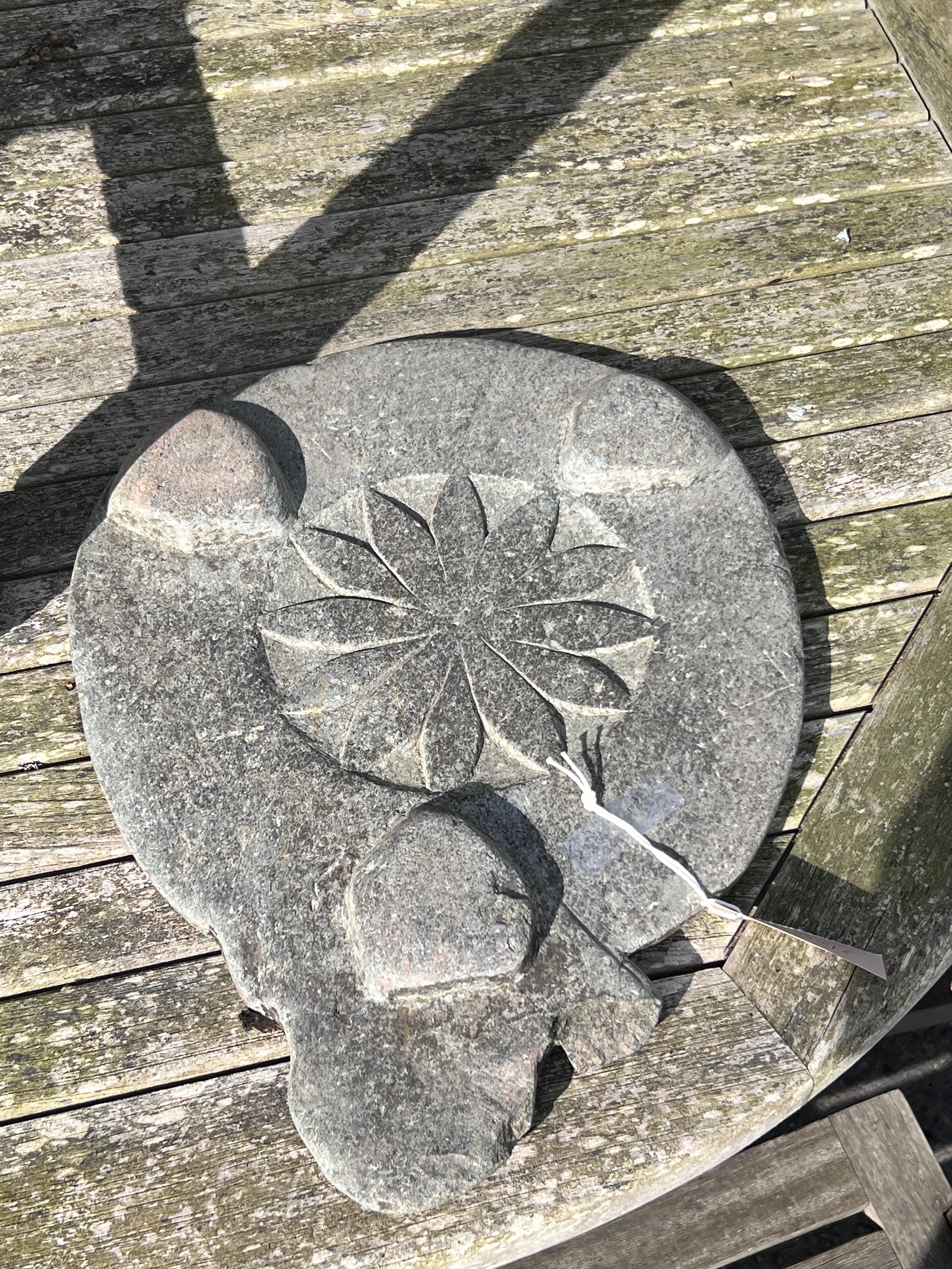 A 19th century Indian slate platter, width 31cm, height 43cm